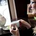 TeaHaus customer Sarah Godek drinks tea with a friend on Friday, April 19. AnnArbor.com I Daniel Brenner